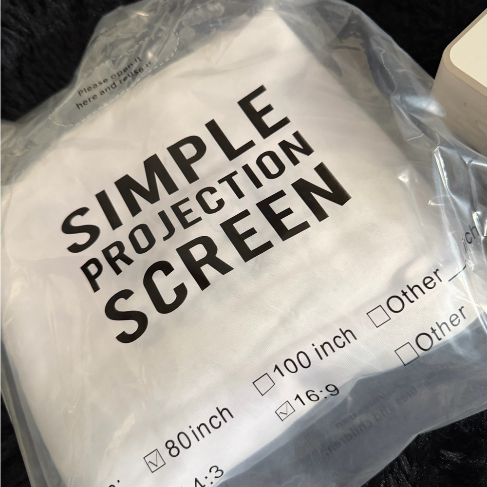 Compact White Mini Projector with Simple Projection Screen - Picture 5 of 5